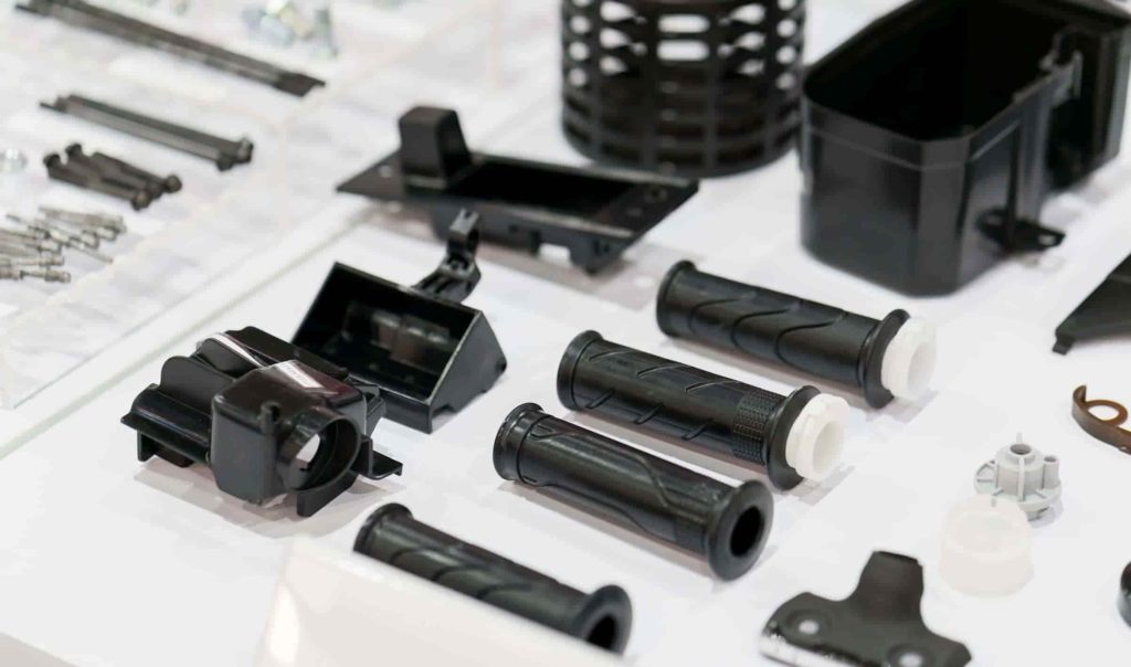 various insert molded and overmolded parts