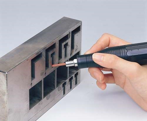 polishing a molding tool with an ultrasonic device