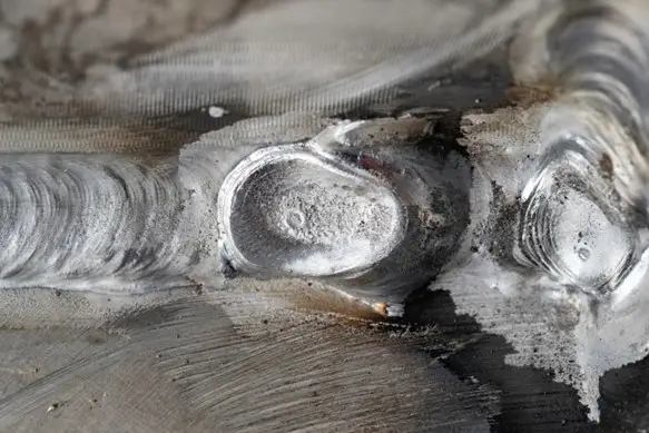 crater cracks on a welded material